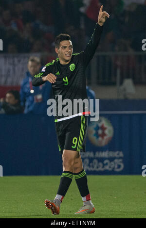 Santiago, Chile. 15th June, 2015. Raul Jimenez of Mexico celebrates sccoring against Chile during the the Group A match of the Copa America 2015, at the National Stadium, in Santiago, Chile, on June 15, 2015. Credit:  Pedro Mera/Xinhua/Alamy Live News Stock Photo