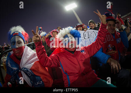 Santiago, Chile. 15th June, 2015. A fan of Chile reacts prior to the Group A match of the Copa America 2015 between Chile and Mexico, to be held at the National Stadium, in Santiago, Chile, on June 15, 2015. Credit:  Pedro Mera/Xinhua/Alamy Live News Stock Photo