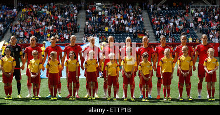 Winnipeg, Canada. 15th June, 2015. Players of Germany line up before the Group B match between Germany and Thailand at the 2015 FIFA Women's World Cup in Winnipeg, Canada, June 15, 2015. Germany won 4-0. Credit:  Wang Lili/Xinhua/Alamy Live News Stock Photo