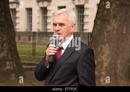 London, UK. 15th June, 2015. MP John McDonald speaks opposite Downing Street as protesters demand the release of Shaker Aamer, the last British resident to be held in detention in Guantanamo bay. © Patricia Phillips/Alamy Live News Stock Photo