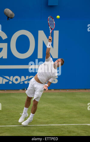 London, UK. 15th June, 2015. Queens Aegon Championship Tennis. Lleyton Hewitt (AUS) serves during his first round match. © Action Plus Sports/Alamy Live News Stock Photo