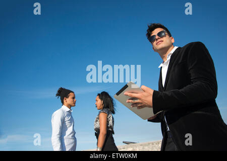 Latin executives with tablet Stock Photo