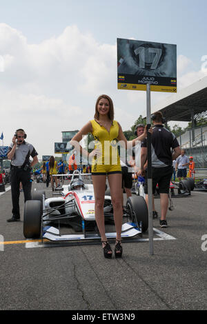 Monza, Italy - May 30, 2015: A grid girl poses during the FIA FORMULA 3 EUROPEAN CHAMPIONSHIP Stock Photo