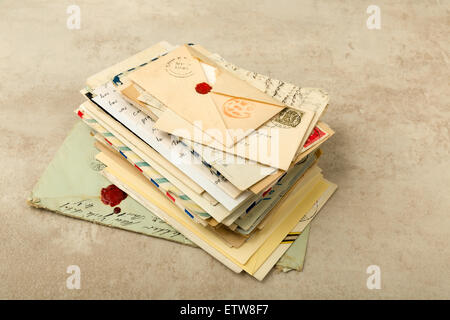 Old envelopes and letters stacked in a bundle Stock Photo