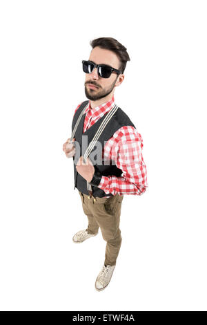 High angle view of young bearded hipster with sunglasses. Full body length portrait isolated over white studio background. Stock Photo