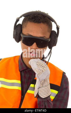 Hispanic industry worker with headphones, sunglasses and gloves in front of camera Stock Photo