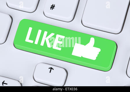 Like button icon thumb up social media or network on internet computer keyboard Stock Photo