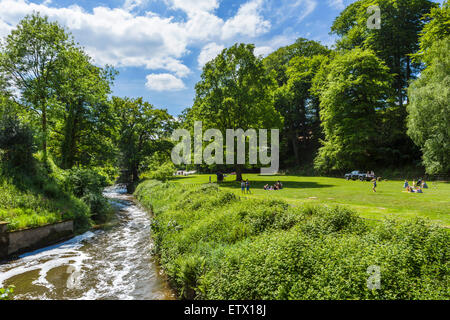River Bollin in the grounds at Quarry Bank Mill, a historic 18thC textile mill in Styal, Cheshire, England, UK Stock Photo