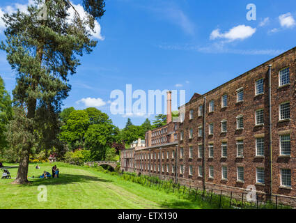 The River Bollin and Quarry Bank Mill, a historic 18thC textile mill in Styal, Cheshire, England, UK Stock Photo