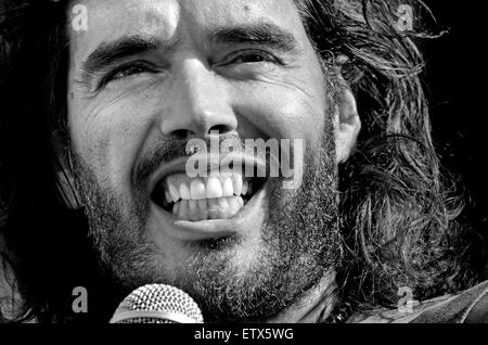 Russell Brand, comedian, speaking at The People's Assembly demonstration against Austerity, Parliament Square, London, 21st June Stock Photo