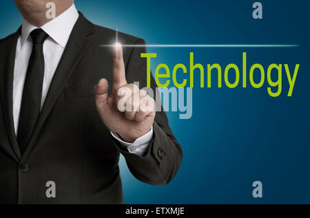 Technology touchscreen is operated by businessman. Stock Photo