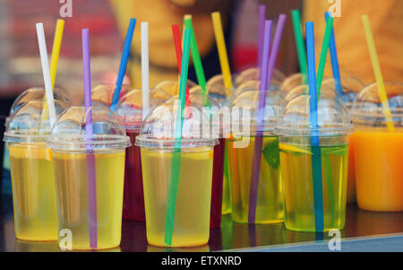 vivid drink in plastic glasses Stock Photo
