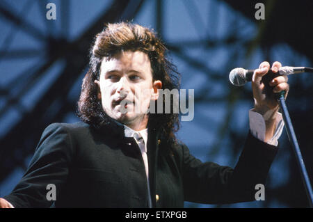 Bono, lead singer of Irish Rock group U2, pictured during the band;'s concert at he Milton Keynes Bowl. 22nd June 1985. Stock Photo