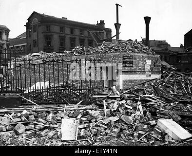 Bomb damage in Liverpool during the Second World War. A street surface shelter which withstood the strain of a tall building which fell upon it during the weekend raids. 2nd September 1940. Stock Photo