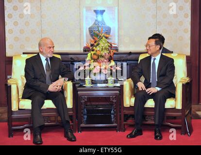 Beijing, China. 16th June, 2015. Chinese State Councilor Yang Jiechi (R) meets with Iraq Foreign Minister Ibrahim al-Jaafari in Beijing, capital of China, June 16, 2015. © Ding Haitao/Xinhua/Alamy Live News Stock Photo