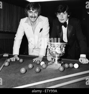 Snooker player Jimmy White pictured receiving a trophy from Cliff Thorburn at Kingston Snooker Hall where he attended a reception. 6th December 1980. Stock Photo