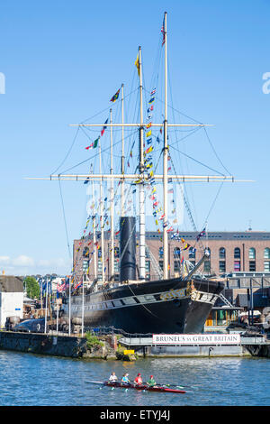 Rowers passing Brunel's SS Great Britain Bristol Docks Bristol Avon England UK GB EU Europe Stock Photo