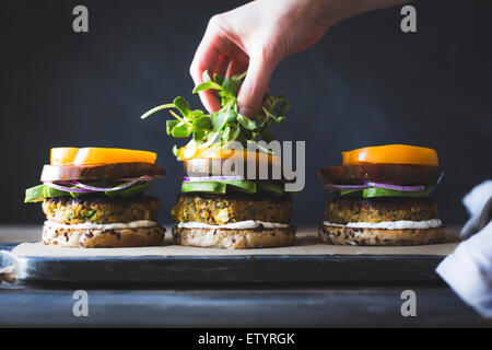 Spiced Zucchini, Feta and Chickpea Veggie Burgers with Minted Yogurt Sauce Stock Photo
