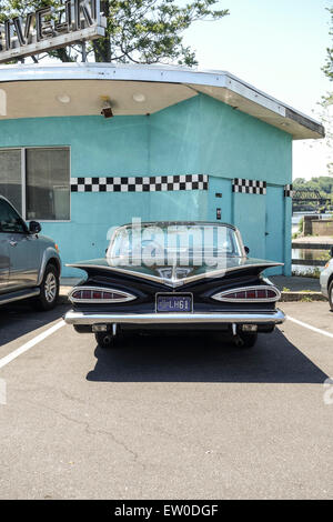 Chevrolet Impala in front of american diner, New Jersey, USA. Stock Photo