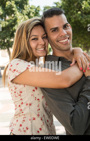 A young Latin couple outdoors Stock Photo