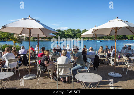 People Sitting in The Lido Cafe Hyde Park London UK Stock Photo