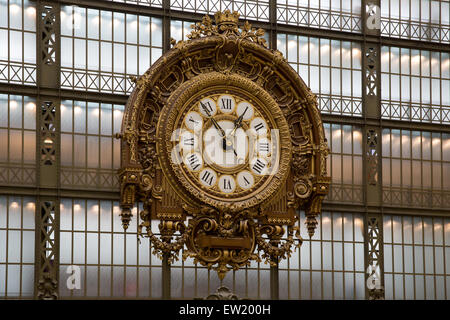Gilded baroque clock in the main hall of the Musee d'Orsay, Paris, France Stock Photo