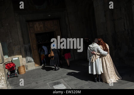 Wedding couple in traditional national costumes in Georgian Orthodox Svetitskhoveli (Living Pillar) Cathedral, Mtskheta, Georgia Stock Photo