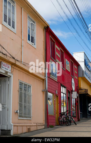 Buildings along a street, Puerto Natales, Patagonia, Chile Stock Photo