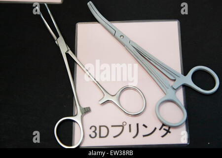 Tokyo, Japan. 17th June, 2015. 3D printing of surgical instruments on display at the Smart Community Japan 2015 in exhibition in Tokyo, Big Sight on June 17, 2015, Tokyo, Japan. The exhibition promotes both domestic and overseas next-generation technologies. The last year 39,879 visitors attend the expo during three days. This year 233 enterprises and organizations will show their products from June 17th to 19th. Credit:  Rodrigo Reyes Marin/AFLO/Alamy Live News Stock Photo
