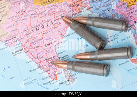 Four bullets on the geographical map of India. Conceptual image for war, conflict, violence. Stock Photo