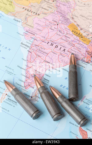 Four bullets on the geographical map of India. Conceptual image for war, conflict, violence. Stock Photo