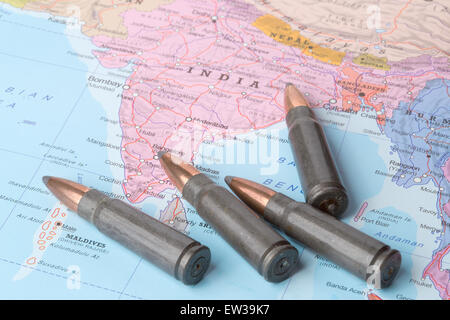 Four bullets on the geographical map of India. Conceptual image for war, conflict, violence. Stock Photo