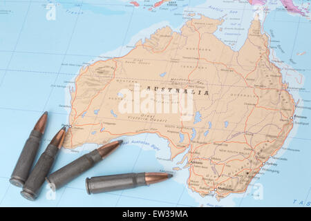 Four bullets on the geographical map of Australia. Conceptual image for war, conflict, violence. Stock Photo
