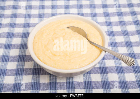 Bowl of hot, creamy, buttery, cheese grits Stock Photo