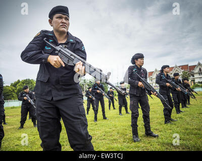 June 17, 2015 - Rangae, Narathiwat, Thailand - Thai women Rangers drill with HK33 Assault Rifles. There are 5 platoons of women Rangers serving in Thailand's restive Deep South. They generally perform security missions at large public events and do public outreach missions, like home wellness checks and delivering food and medicine into rural communities. The medics frequently work in civilian clothes because the Rangers found people are more relaxed around them when they're in civilian clothes. About 6,000 people have been killed in sectarian violence in Thailand's three southern provinces of Stock Photo