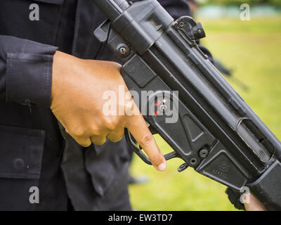 June 17, 2015 - Rangae, Narathiwat, Thailand - A Thai woman Ranger drills with an HK33 Assault Rifle. There are 5 platoons of women Rangers serving in Thailand's restive Deep South. They generally perform security missions at large public events and do public outreach missions, like home wellness checks and delivering food and medicine into rural communities. The medics frequently work in civilian clothes because the Rangers found people are more relaxed around them when they're in civilian clothes. About 6,000 people have been killed in sectarian violence in Thailand's three southern province Stock Photo