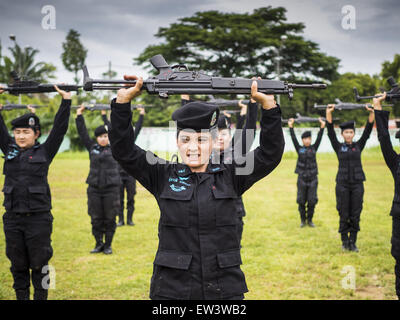 June 17, 2015 - Rangae, Narathiwat, Thailand - Thai women Rangers drill with HK33 Assault Rifles. There are 5 platoons of women Rangers serving in Thailand's restive Deep South. They generally perform security missions at large public events and do public outreach missions, like home wellness checks and delivering food and medicine into rural communities. The medics frequently work in civilian clothes because the Rangers found people are more relaxed around them when they're in civilian clothes. About 6,000 people have been killed in sectarian violence in Thailand's three southern provinces of Stock Photo