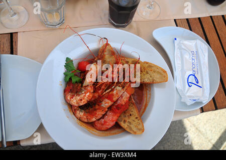 King Prawns Panorama with garlic bread is a recommended dish at the panorama restaurant on Mount Srd Stock Photo