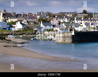 Looking at Cemaes harbour and village from the beach.Isle of Anglesey, North Wales, UK Stock Photo