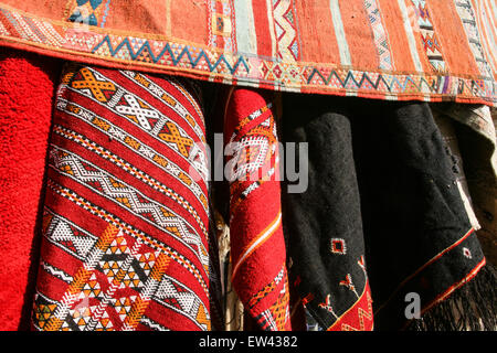 Colourful carpets for sale at this square, the Criee Berbere (carpet souk) one of the few open spaces amongst the maze of narrow Stock Photo