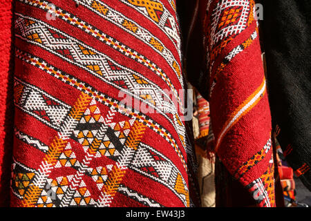 Colourful carpets for sale at this square, the Criee Berbere (carpet souk) one of the few open spaces amongst the maze of narrow Stock Photo