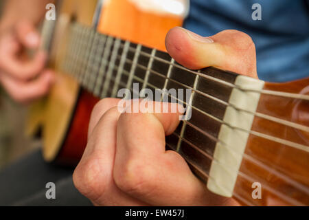 close up of playing a guitar Stock Photo