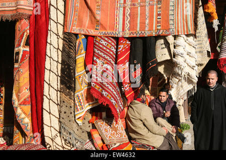 Colourful carpets for sale at this square, the Criee Berbere (carpet souk) one of the few open spaces amongst the maze of narrow Stock Photo