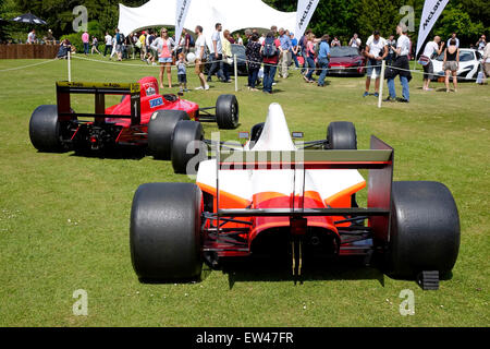 Two 1990 Formula One racing cars that were driven by Ayrton Senna and Alain Prost on display at the Wilton House Classic & Supercar Show 2015 Stock Photo