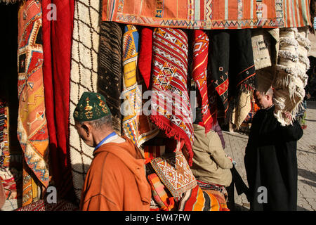 Colourful carpets for sale at this square, the Criee Berbere (carpet souk) one of the few open spaces amongst the maze of narrow Stock Photo