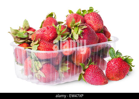 Freshly strawberries in a plastic tray and two near rotated isolated on white background Stock Photo