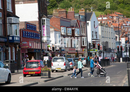 Family crossing the road Foreshore Road Scarborough, North Yorkshire, England UK Stock Photo