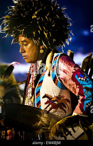 A Native American man participates in a dance at a powwow in Mesa Verde Colorado. Stock Photo