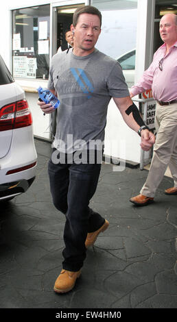 Mark Wahlberg leaves E Baldi n Beverly Hills wearing a Kinesiology Tape on his left arm  Featuring: Mark Wahlberg Where: Los Angeles, California, United States When: 16 Apr 2015 C Stock Photo