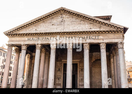 The facade of the Pantheon in Rome: columns and the pediment in a sunny winter day Stock Photo